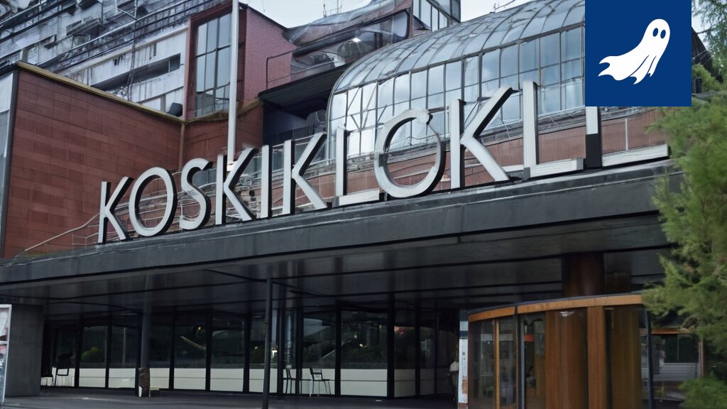 Kuva Koskikeskuksesta Tampereella, jossa näkyy futuristisia elementtejä, kuten hologrammeja ja liukuportaita.